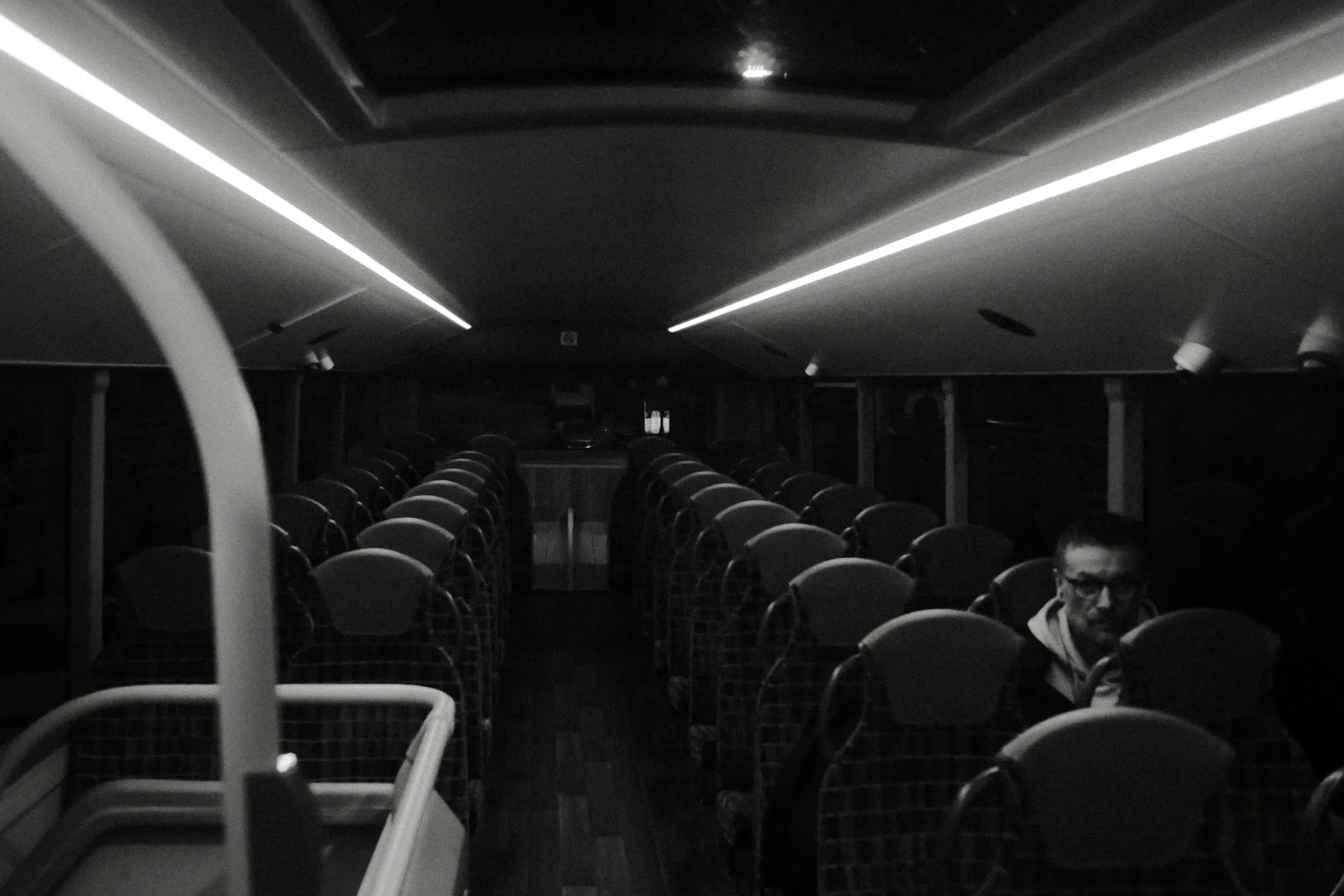A man rides the upper deck of the 158 bus, Leyton