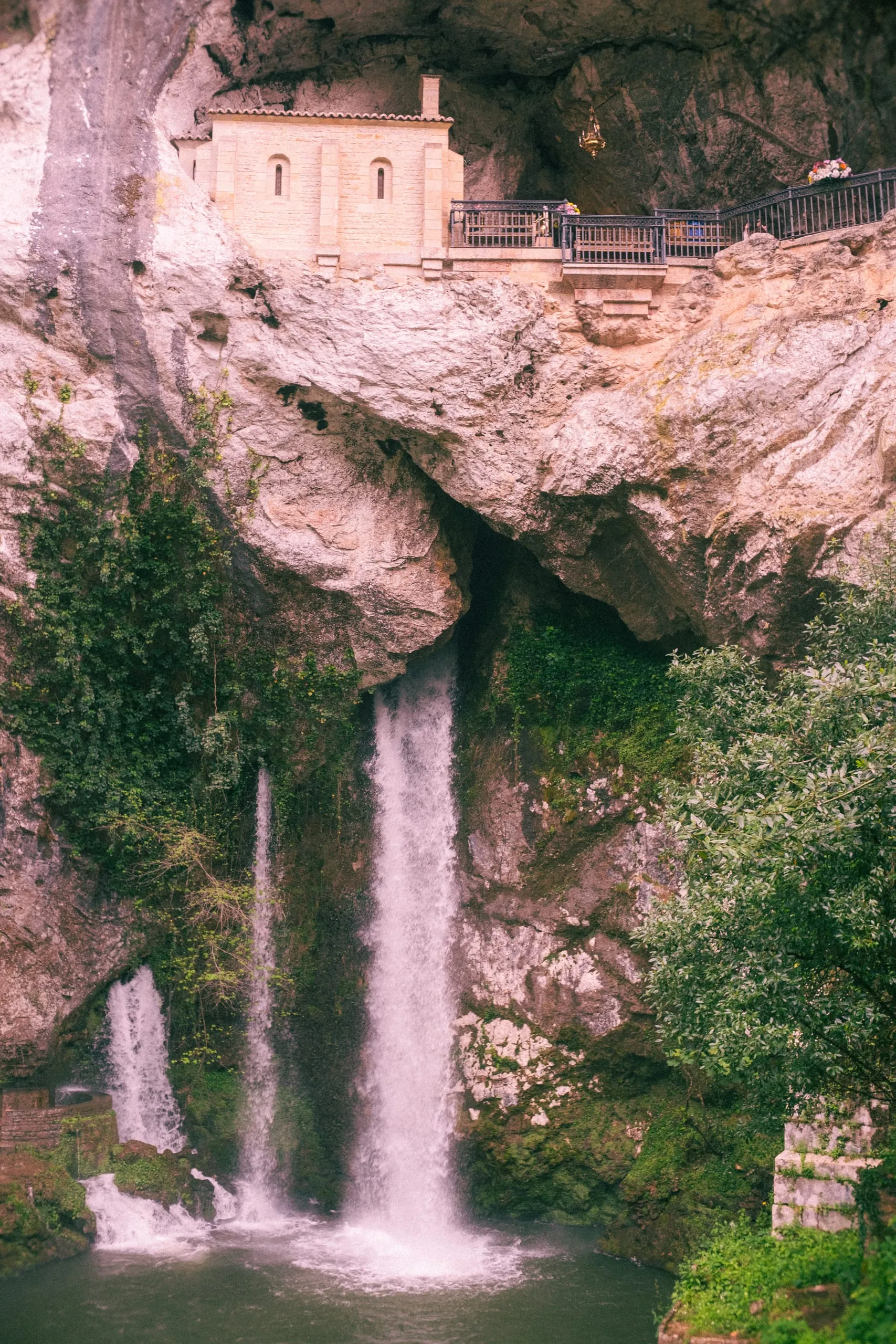 Chapel and waterfall at the end of the Cave of Covadonga, Onís