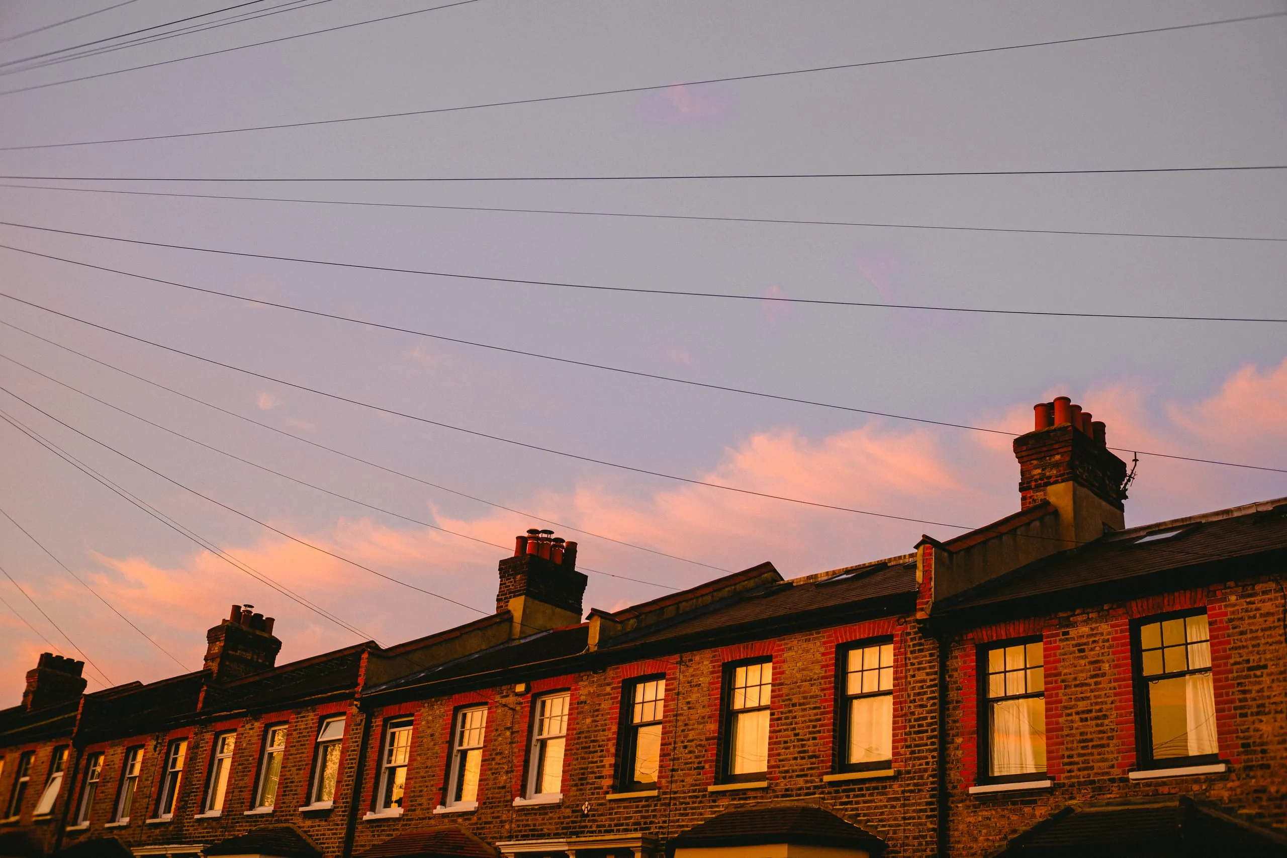 Sun sets over a row of homes, Walthamstow