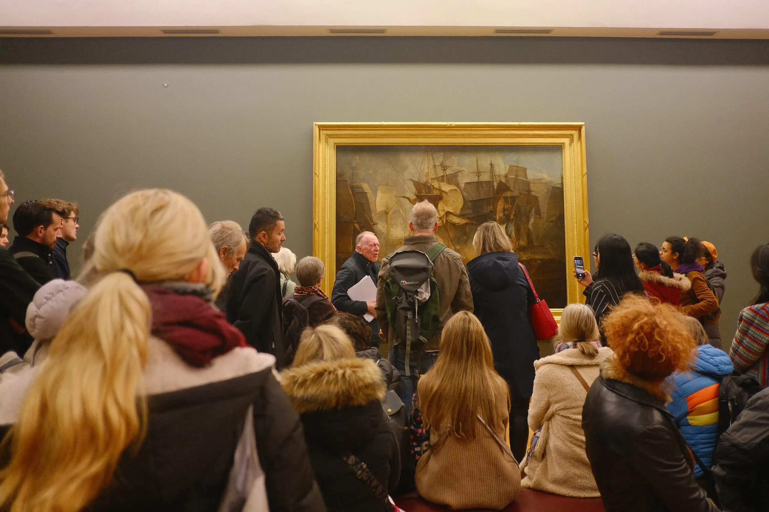 A guide explains a work by Turner, Tate Britain