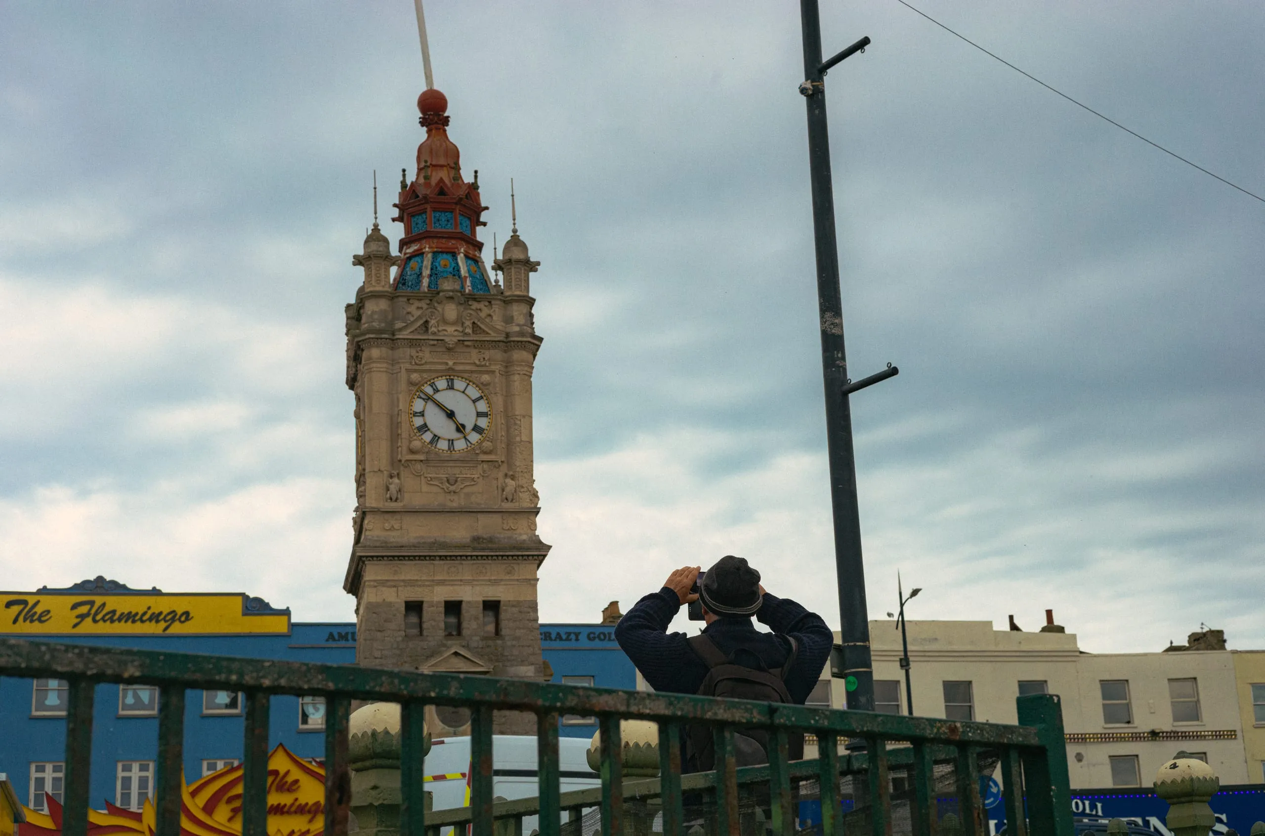 A man photographs the margate clock tower