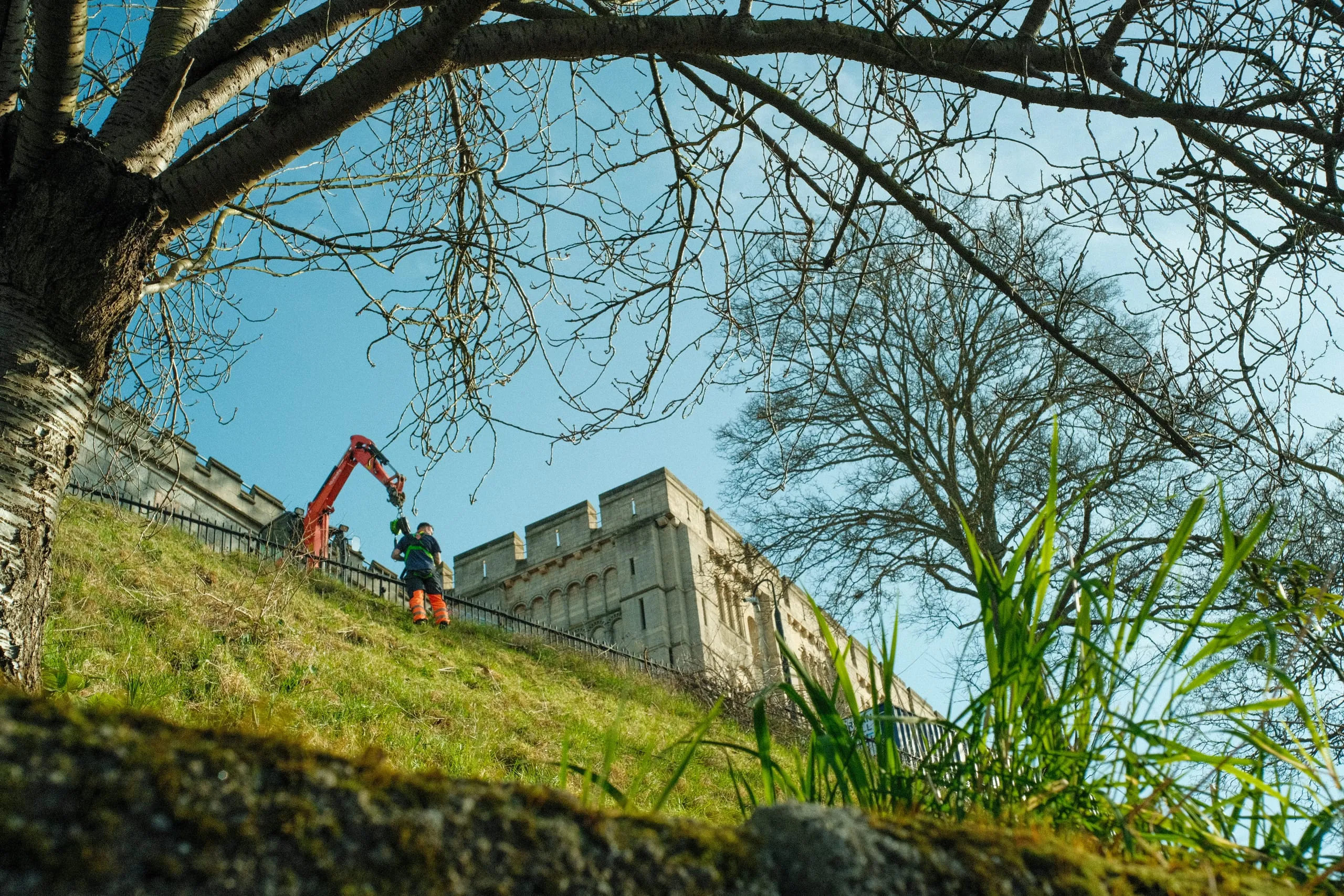 Council workers tend to the castle grounds, Norwich