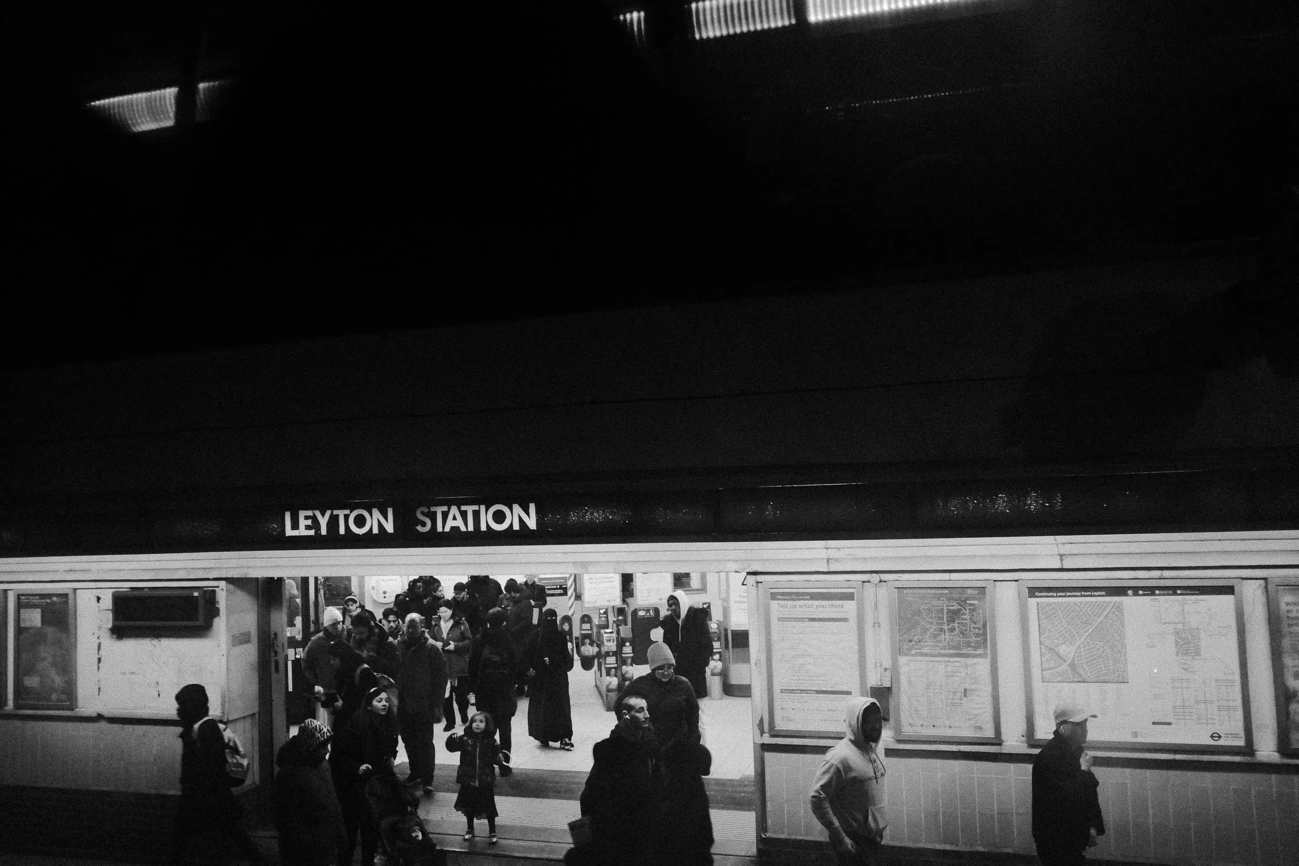 People arrive in Leyton Station, Leyton