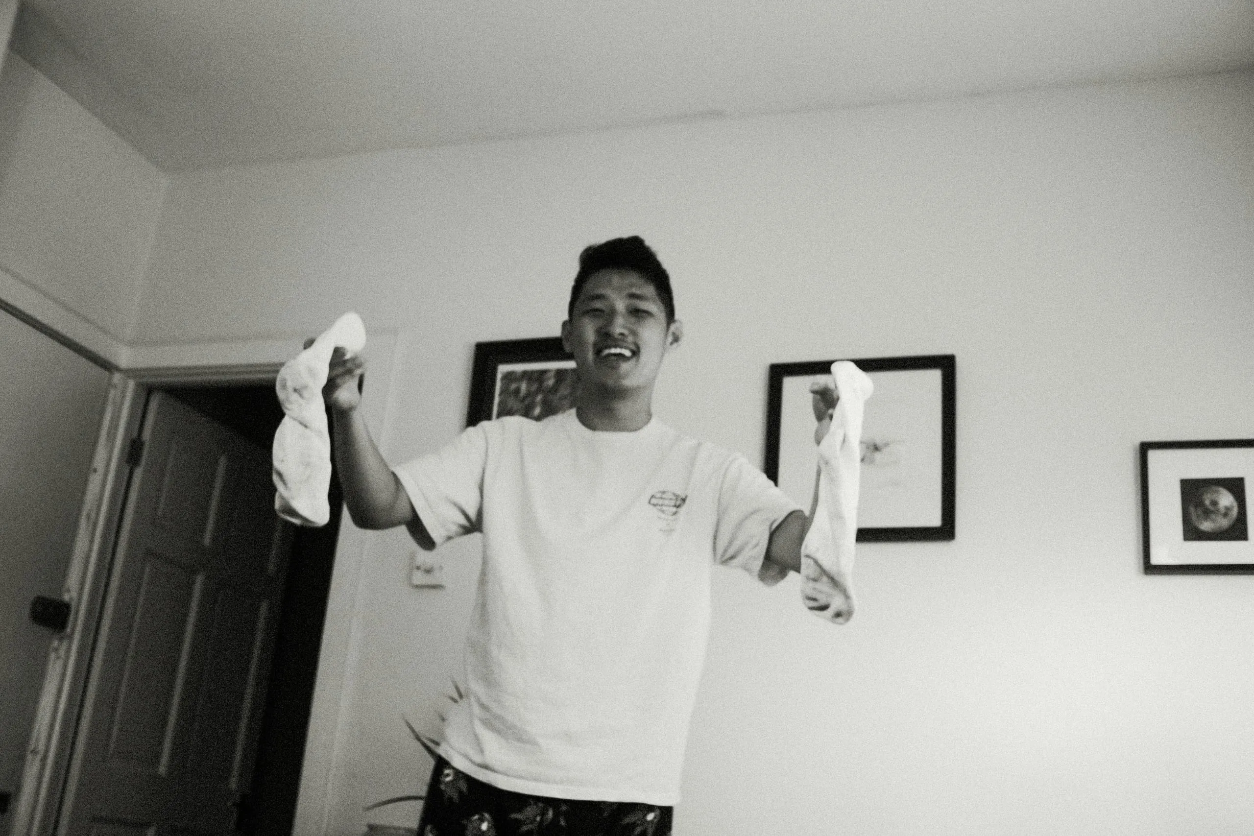 Bo holds a pair of dirty socks