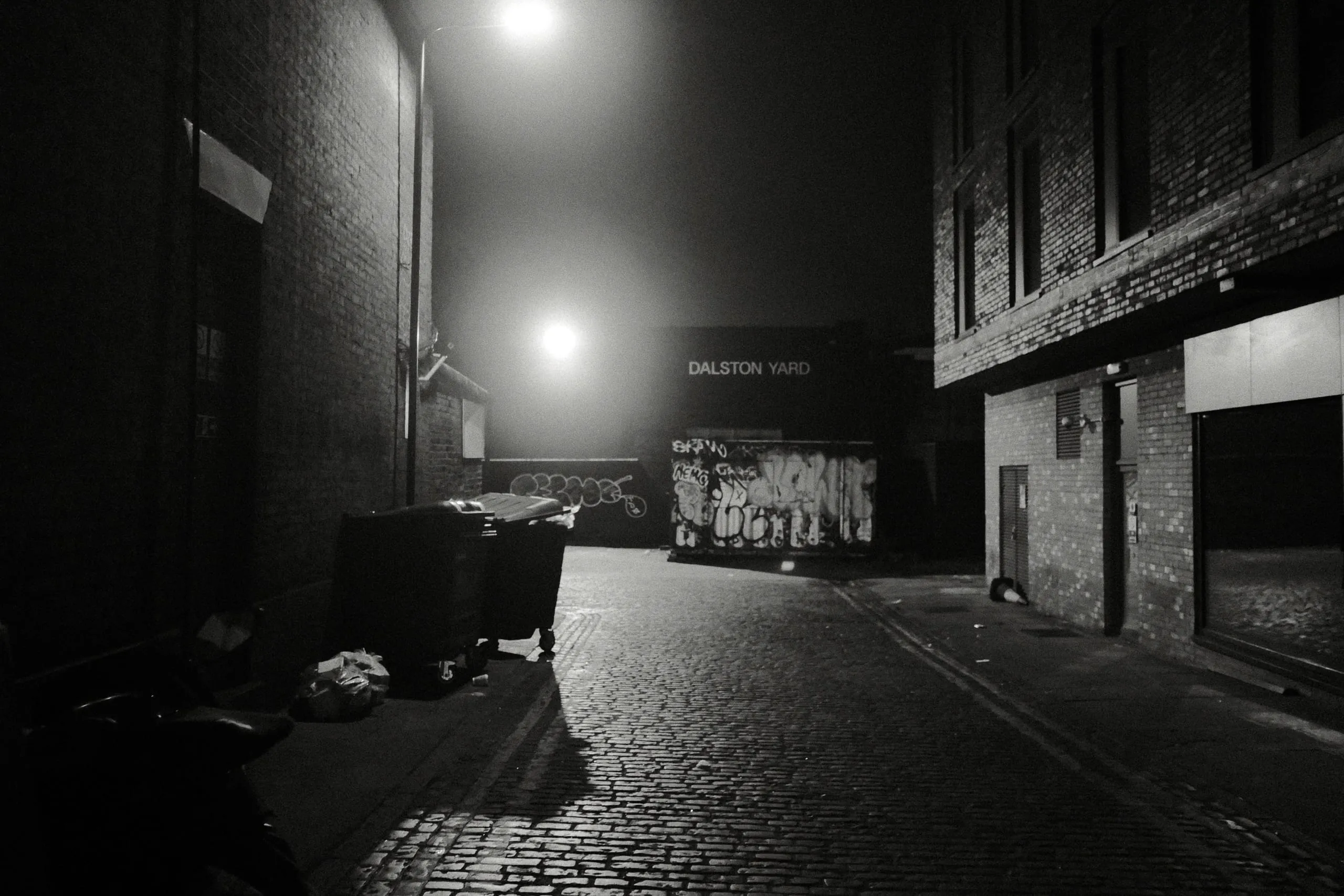 Dalston yard entrance at night, Dalston