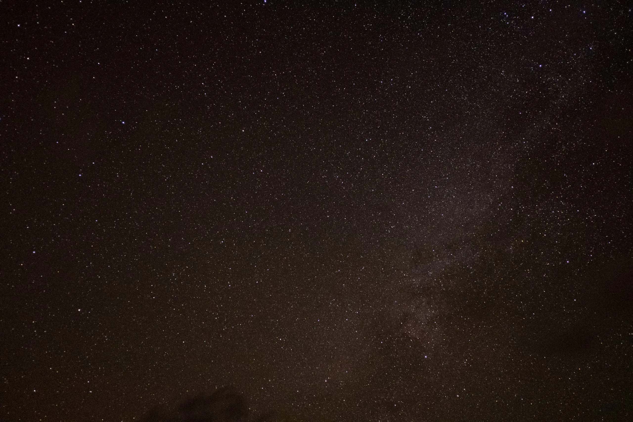 Stars and the Milky Way over a dark sky