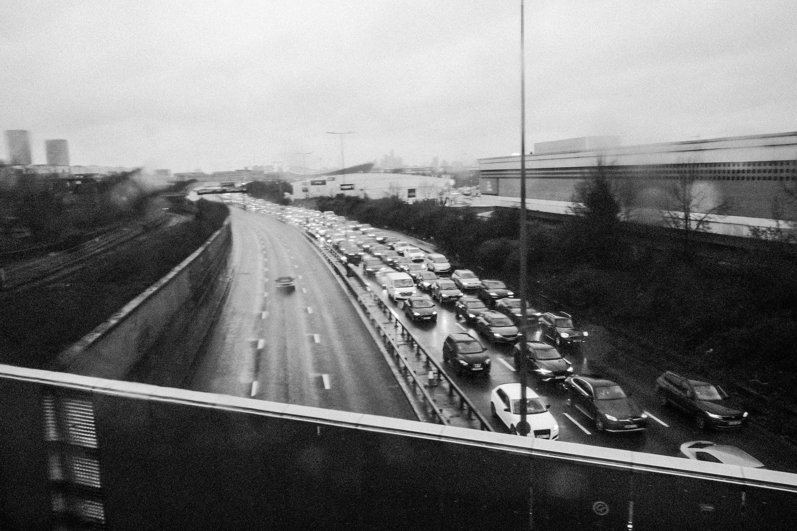 A convertible Mercedes drives into London while the A12 Northbound is collapsed, Leyton