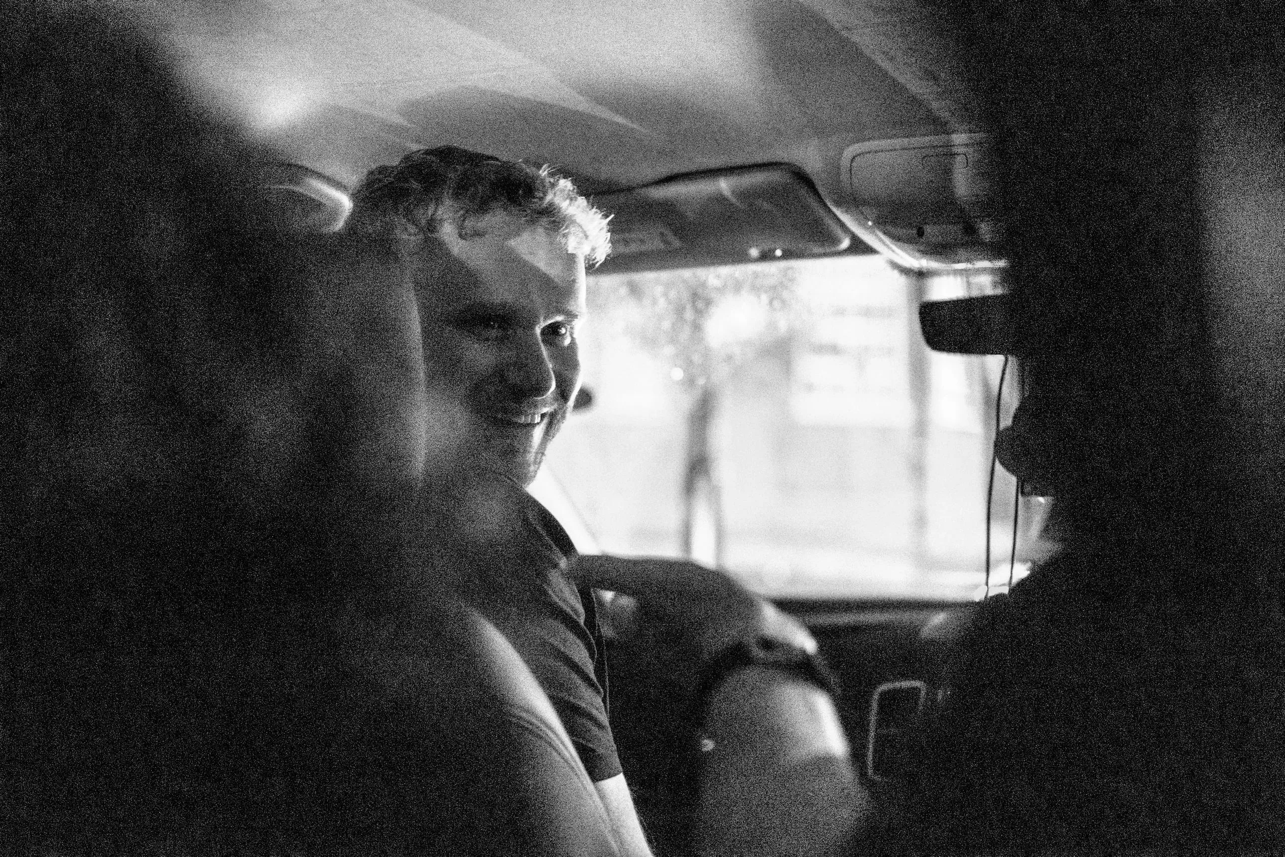 Sam addresses the rest of the group on a cab ride, Hackney