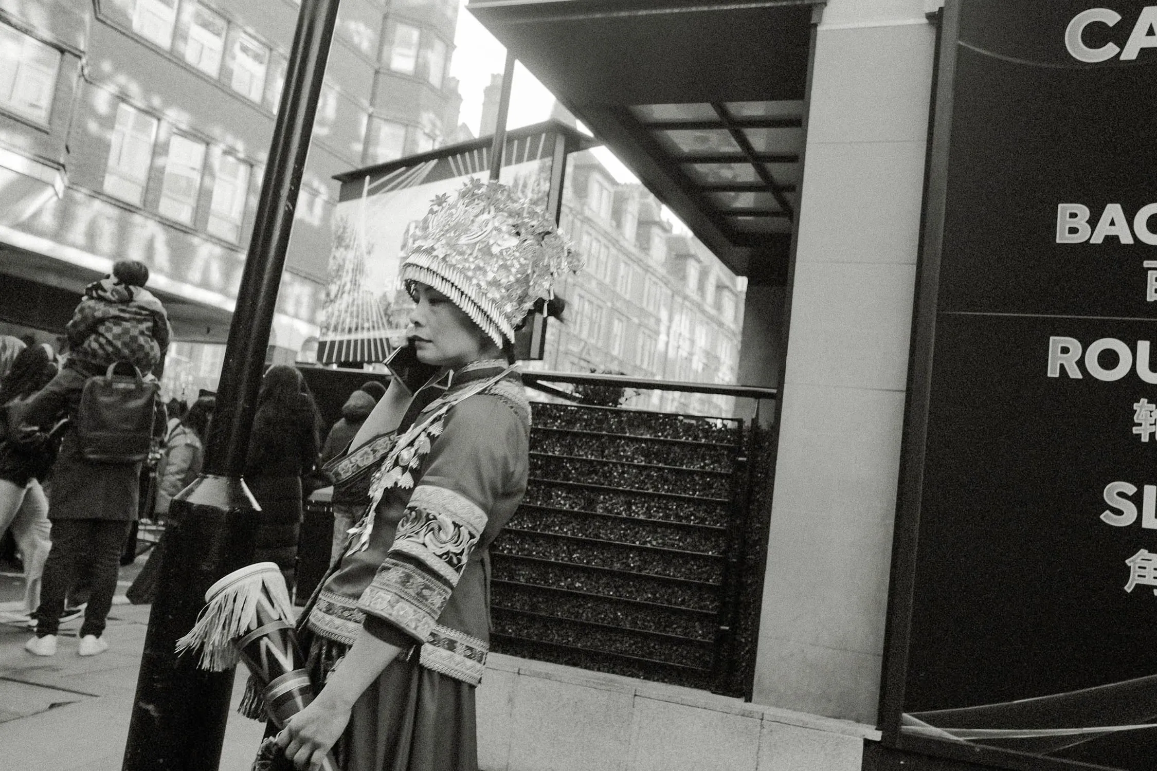 A woman makes a phone call on Lunar New Year, Chinatown